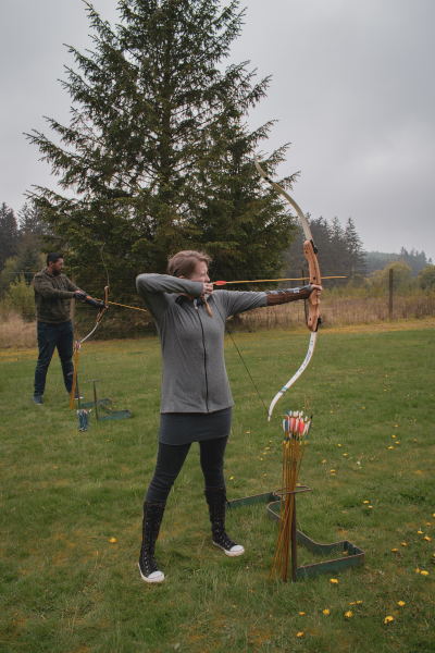 instructor firing arrow. Photo by Aga Lapucha 